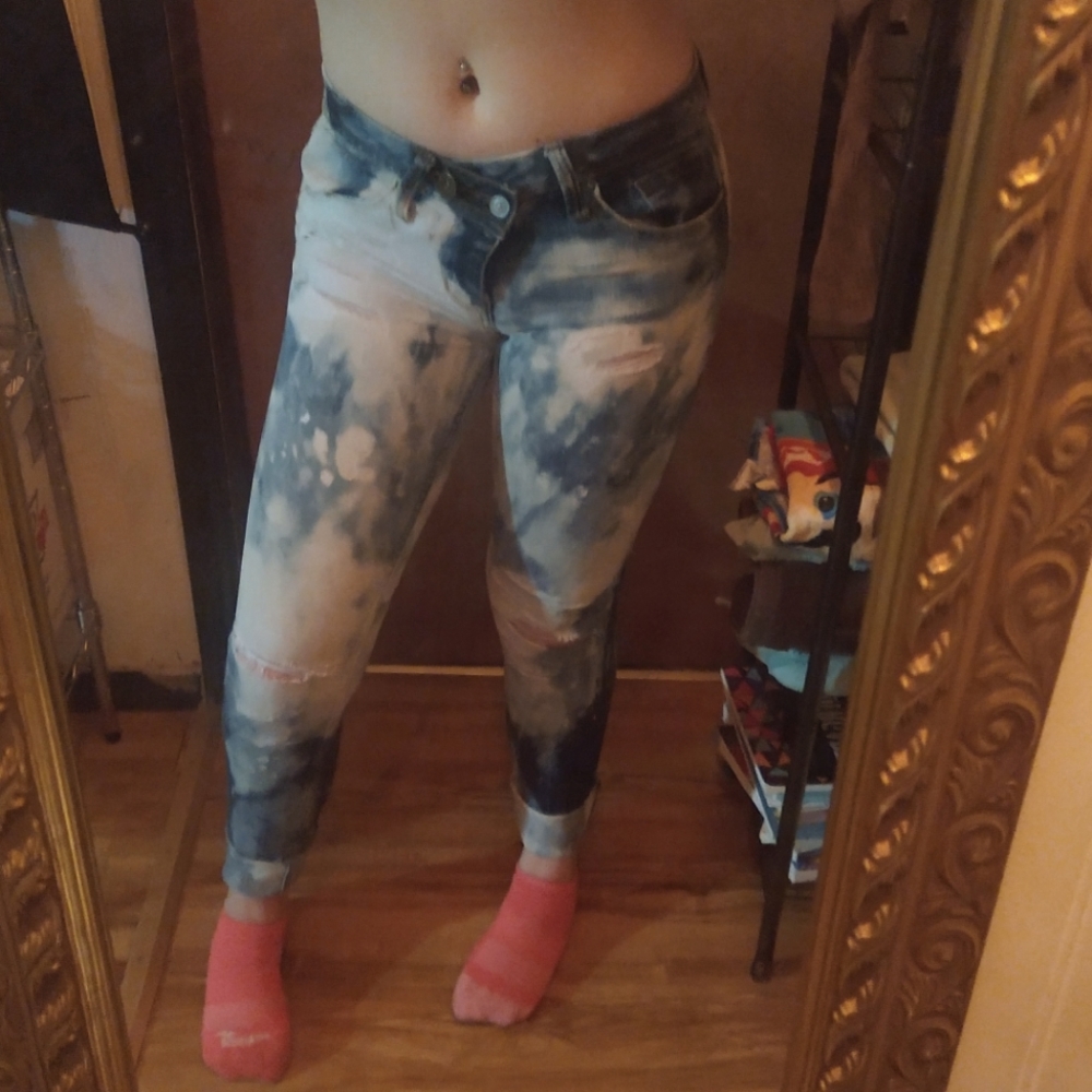 Distressed Acid wash jeans